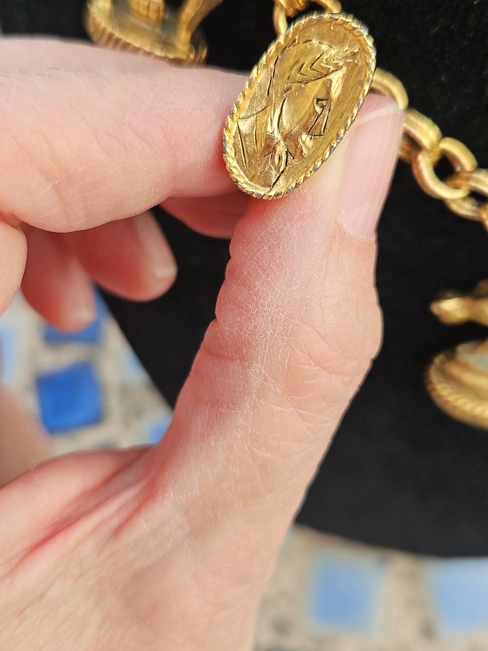 Goldtone Charm Necklace - Picture 2 of 4